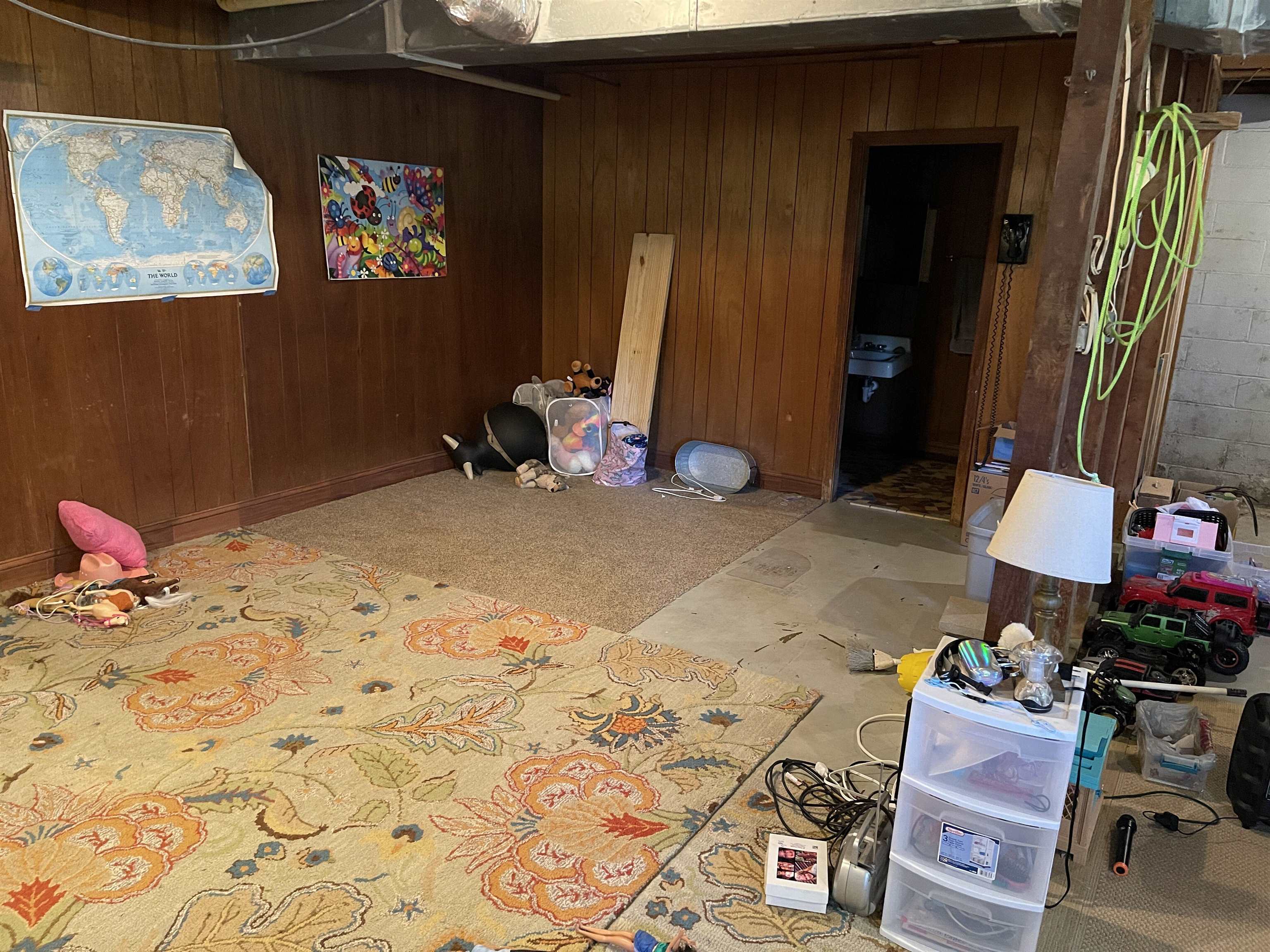 81 Puron Road Adamsville, TN 38310 - Photo 29 of 40 a room with furniture and a flat screen tv