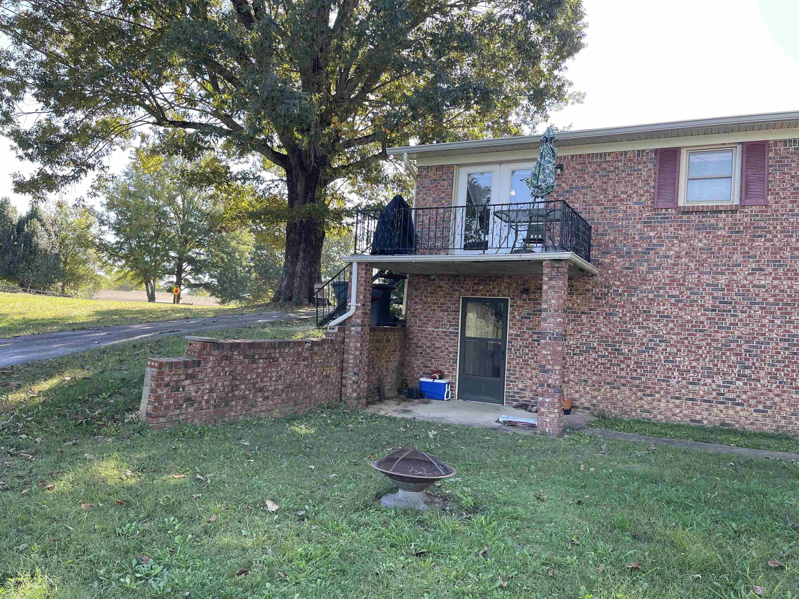 81 Puron Road Adamsville, TN 38310 - Photo 36 of 40 front view of a house with a yard
