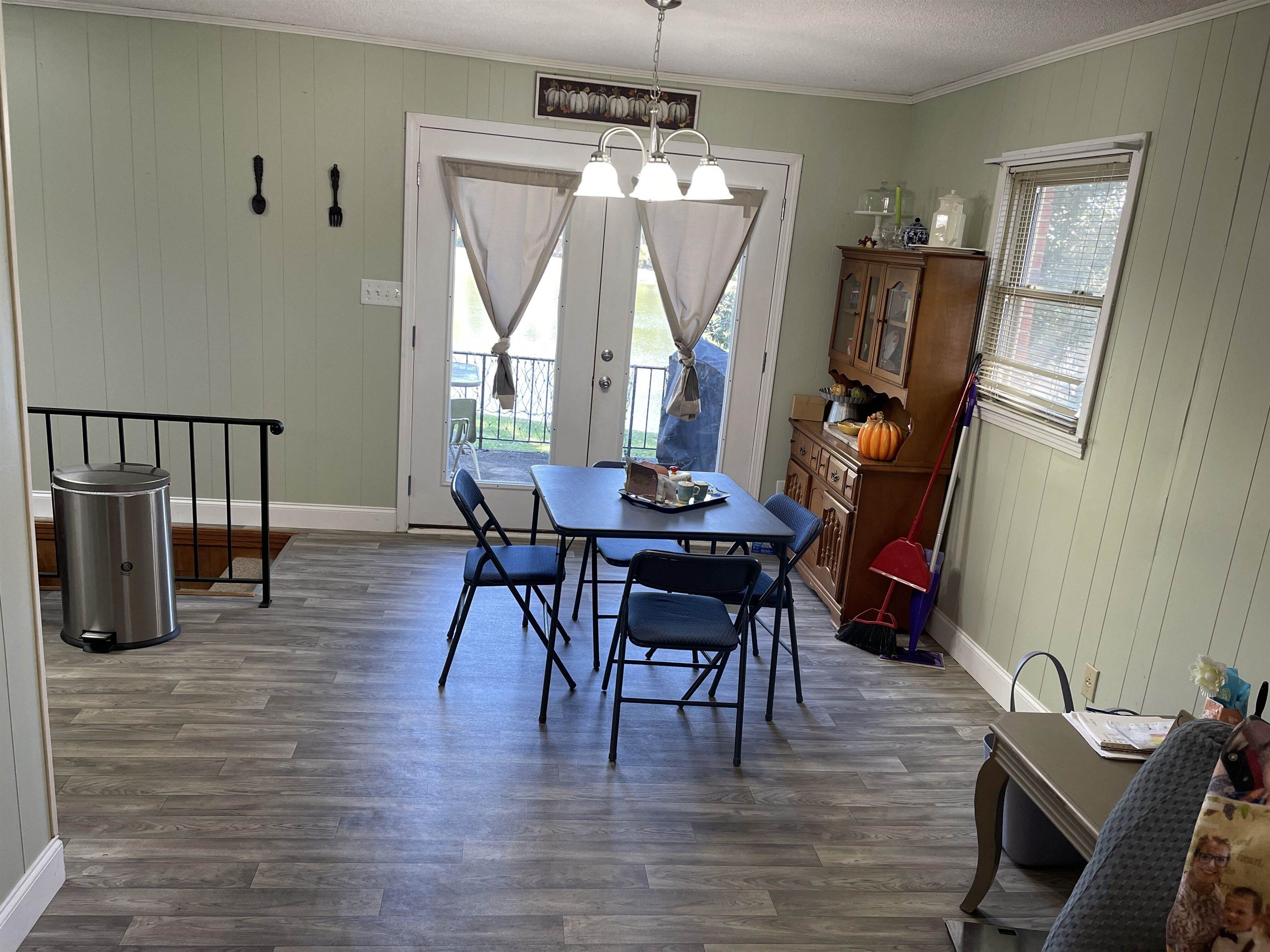 81 Puron Road Adamsville, TN 38310 - Photo 7 of 40 a view of a dining room with furniture and window