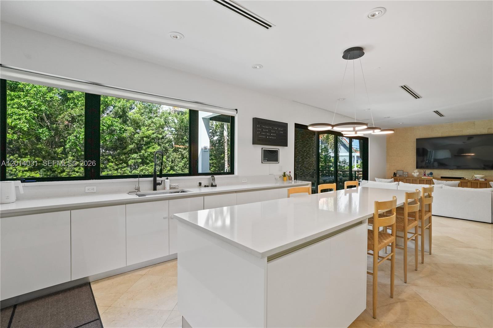 762 Fernwood Road Key Biscayne, FL 33149 - Photo 27 of 82 a large white kitchen with a large window