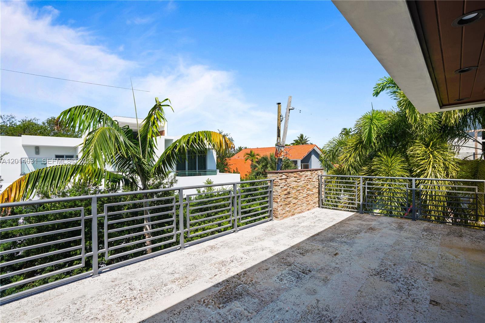 762 Fernwood Road Key Biscayne, FL 33149 - Photo 54 of 82 a view of street along with wooden stairs