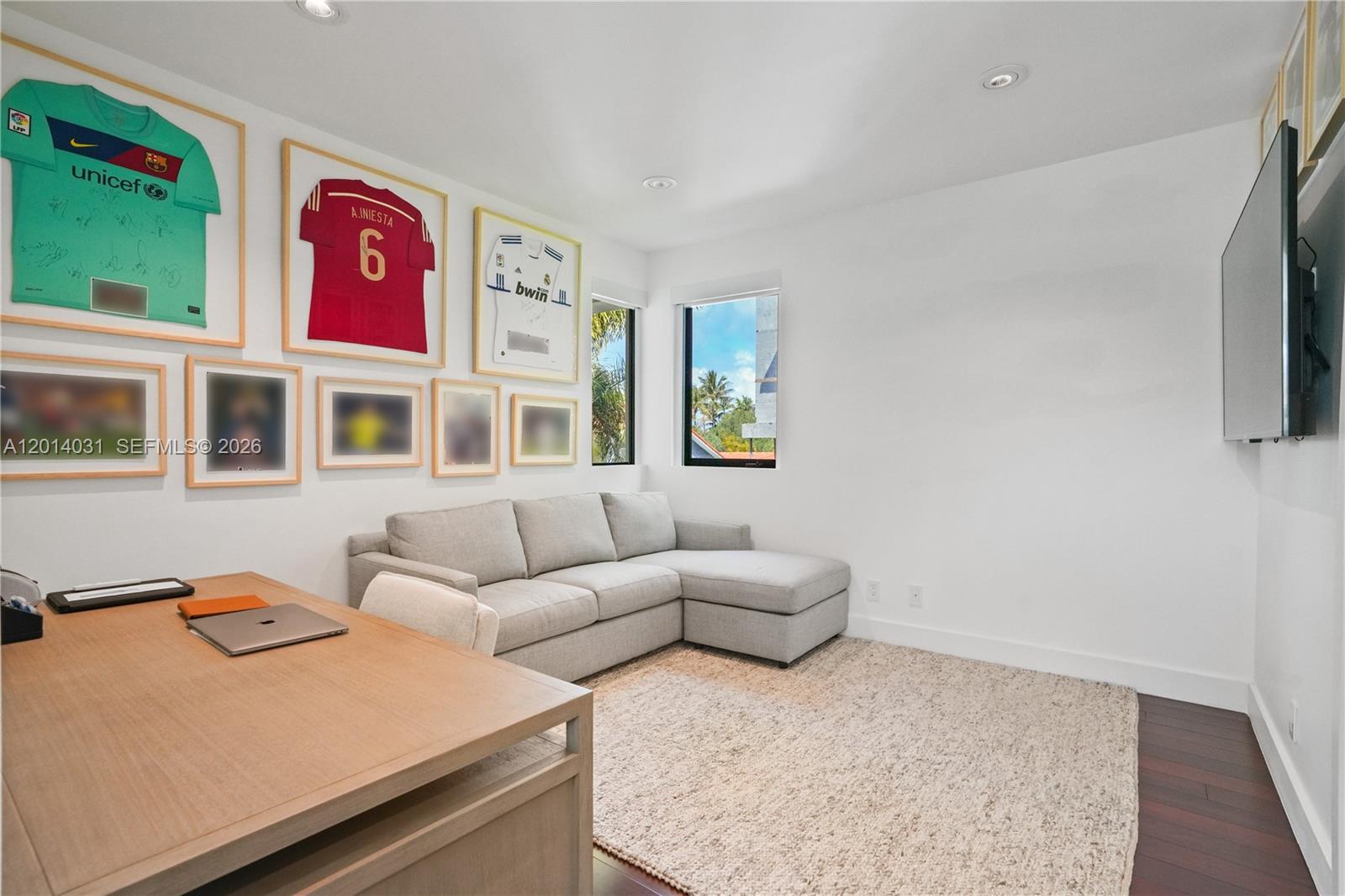 762 Fernwood Road Key Biscayne, FL 33149 - Photo 56 of 82 a living room with furniture and a couch