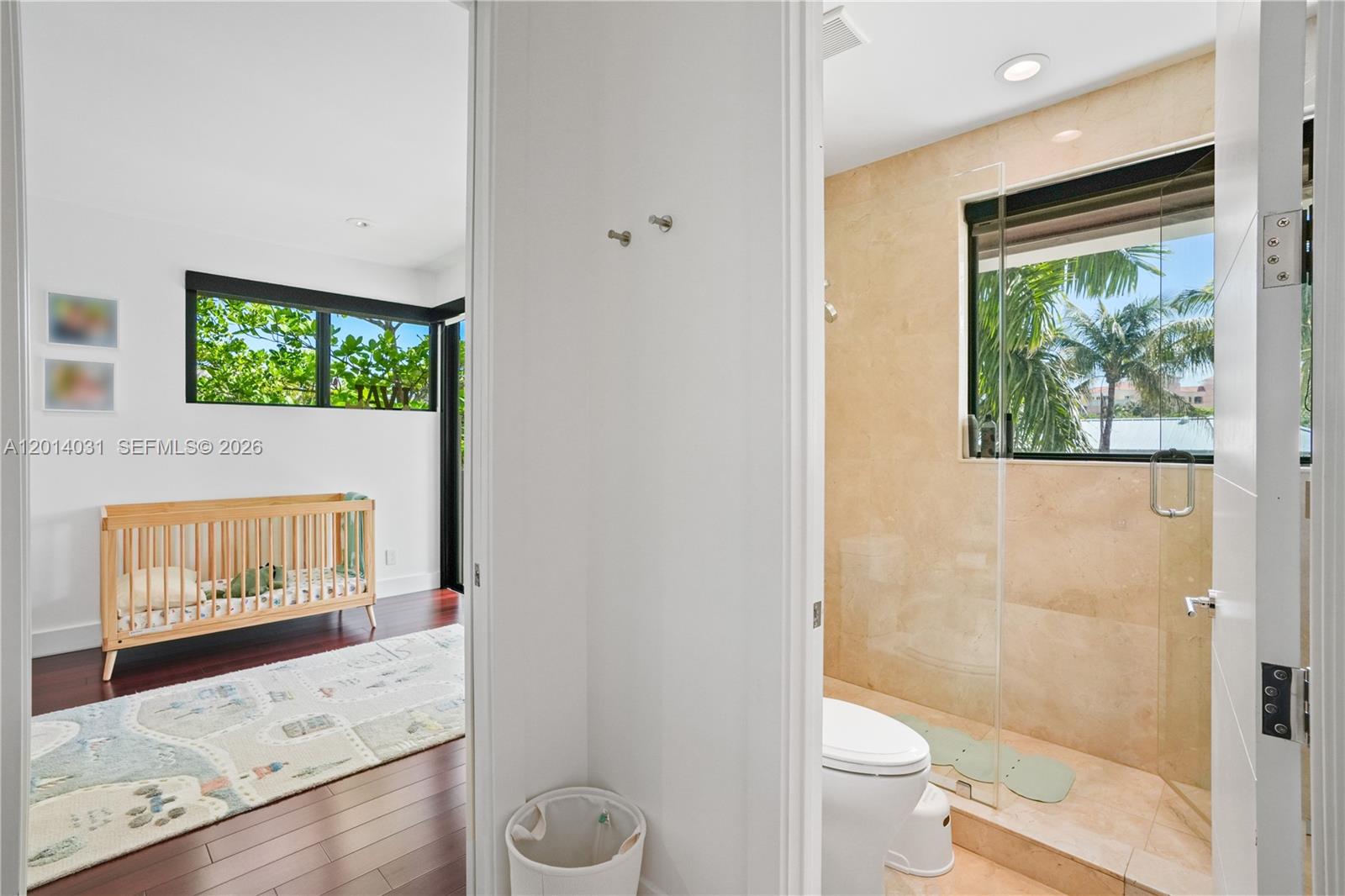 762 Fernwood Road Key Biscayne, FL 33149 - Photo 66 of 82 a bathroom with a toilet sink and a shower