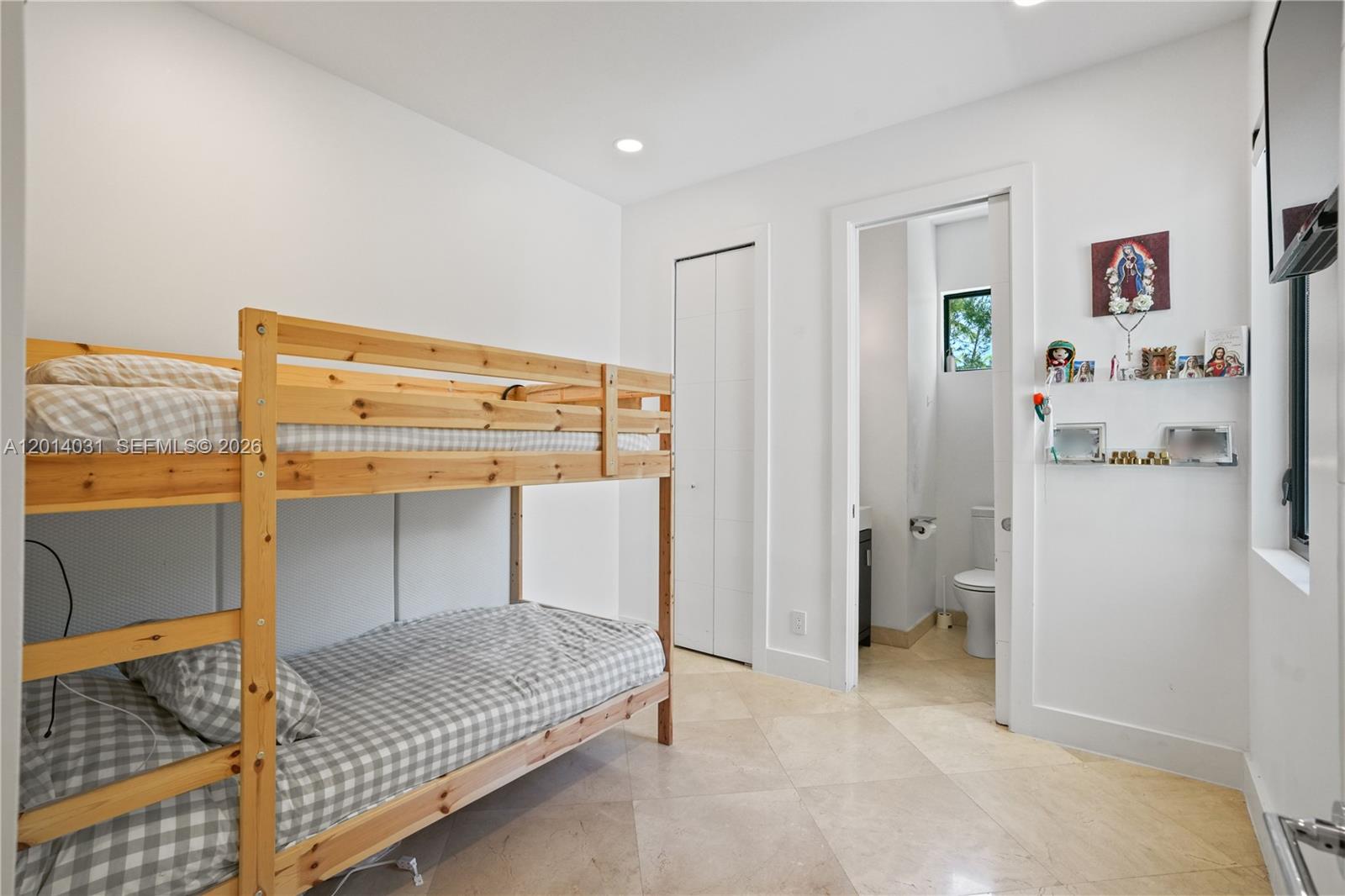 762 Fernwood Road Key Biscayne, FL 33149 - Photo 74 of 82 a bedroom with a bed and a window
