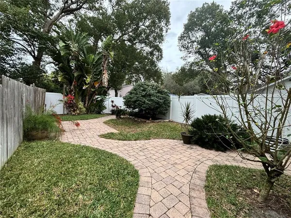a view of a garden with pathway