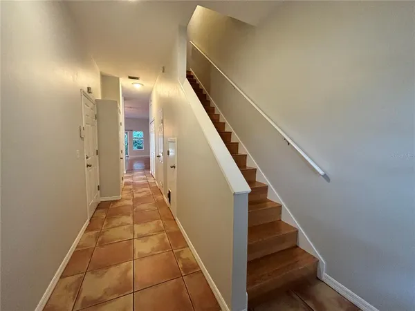 a view of hallway with stairs