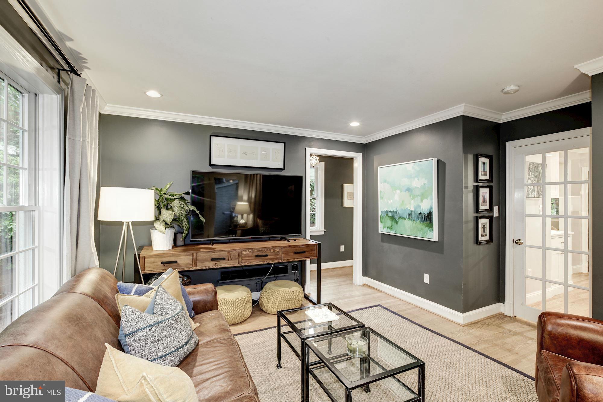 3055 Military Road Arlington, VA 22207 - Photo 12 of 30 a living room with furniture and a flat screen tv
