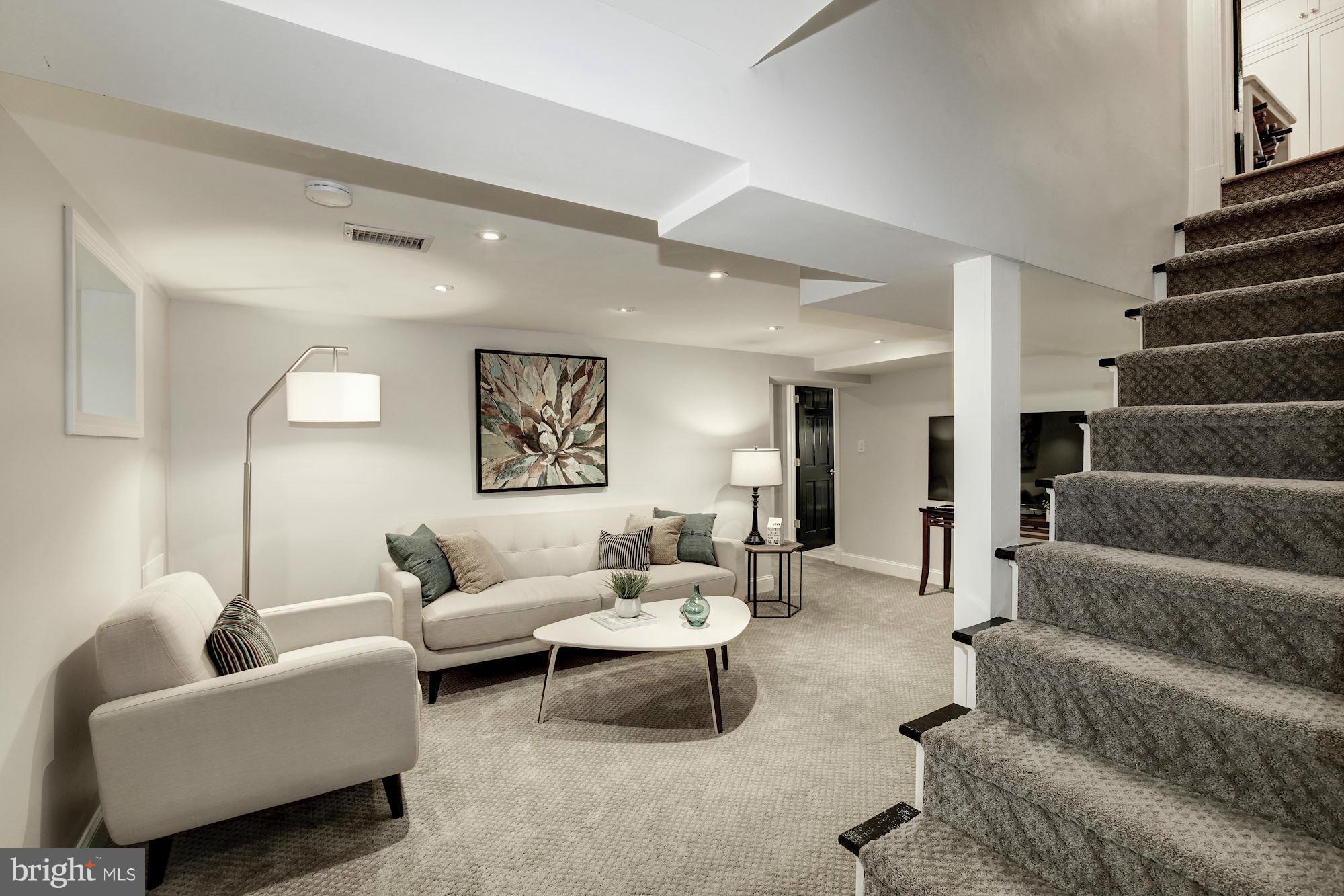 3055 Military Road Arlington, VA 22207 - Photo 23 of 30 a living room with furniture and a ceiling fan