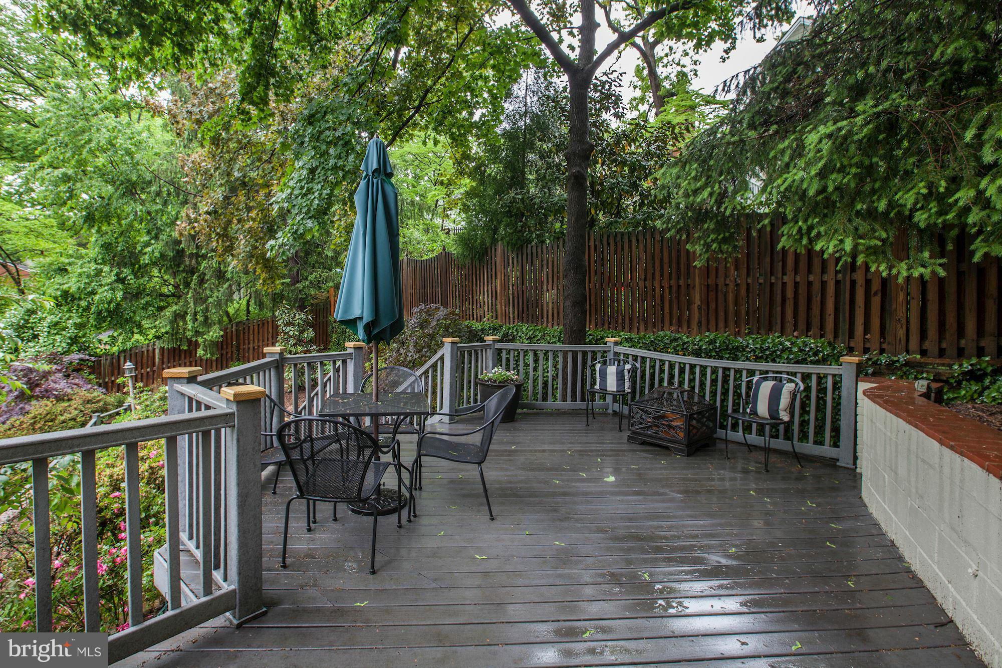 3055 Military Road Arlington, VA 22207 - Photo 29 of 30 a view of a chair and table on the wooden deck