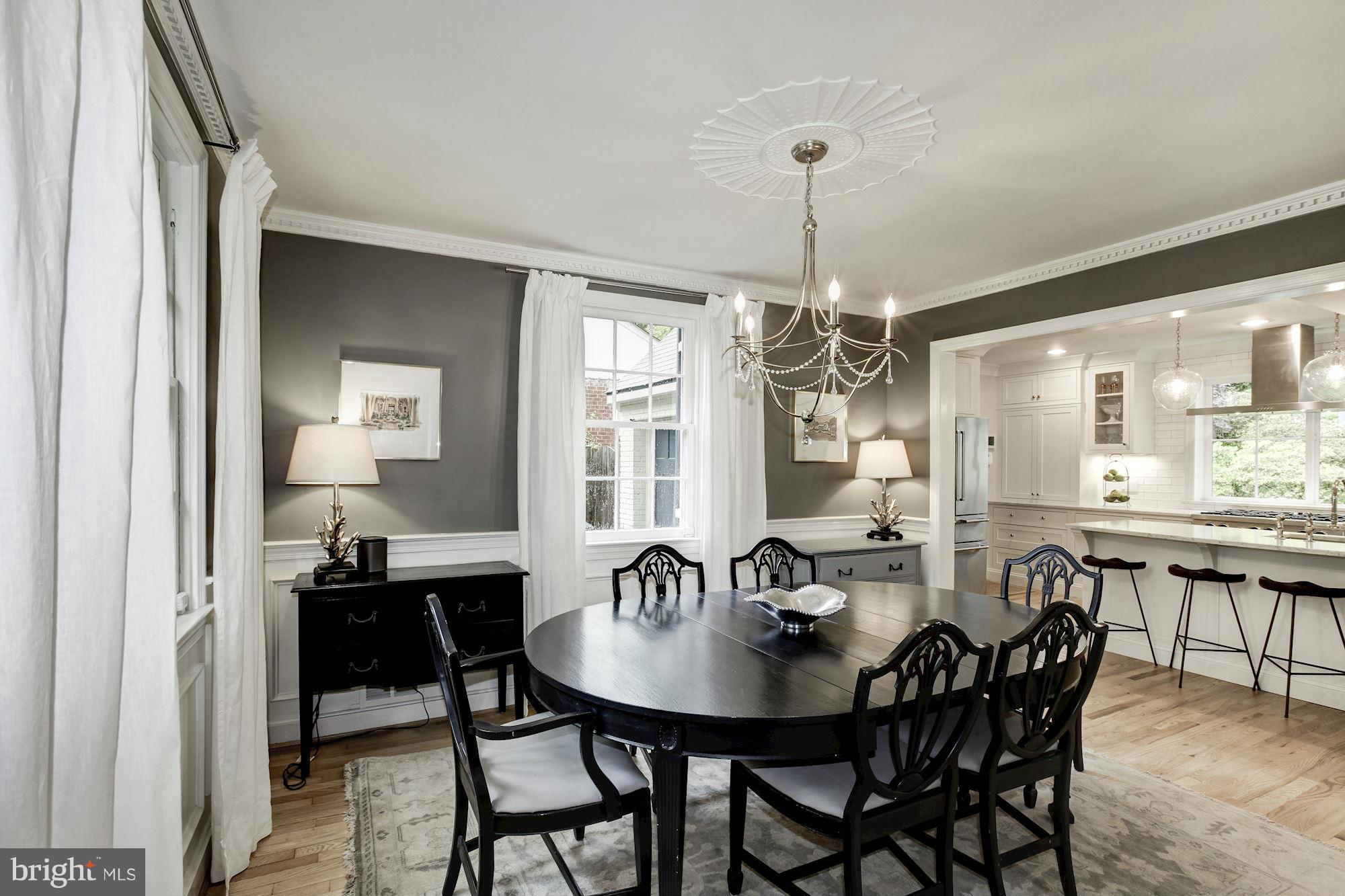 3055 Military Road Arlington, VA 22207 - Photo 4 of 30 a view of a a dining room with furniture window and wooden floor