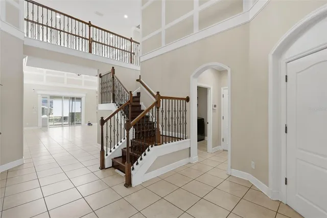 a kitchen with stainless steel appliances granite countertop a stove top oven sink and cabinets