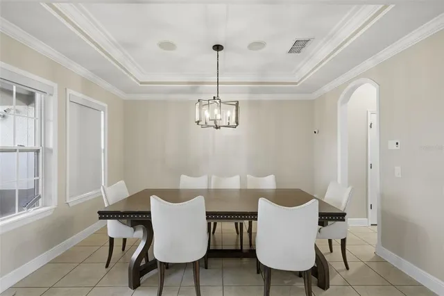 a view of room with stairs and wooden floor