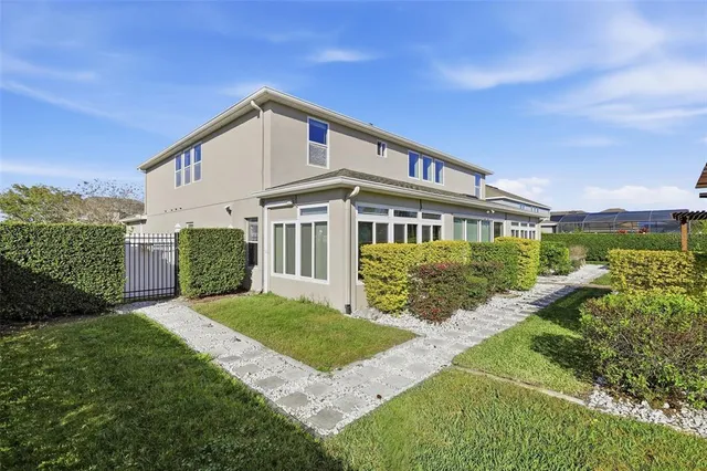 a view of a house with a yard