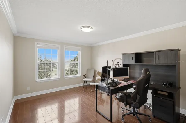 a kitchen with a refrigerator and cabinets
