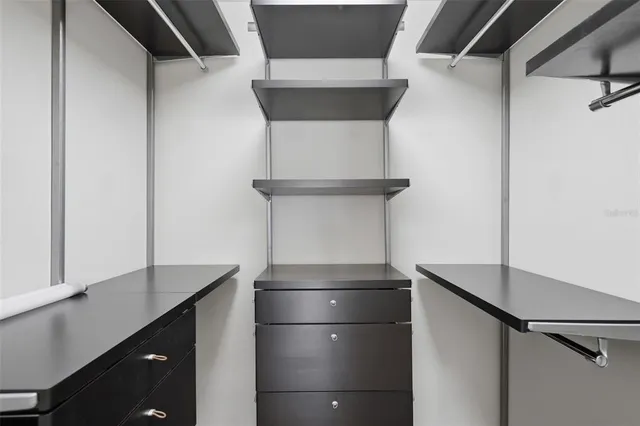 a view of entryway with livingroom and wooden floor