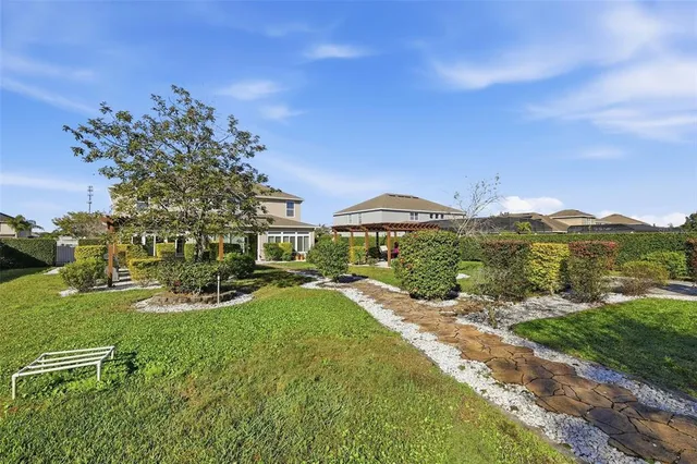 a view of a garden with a lake