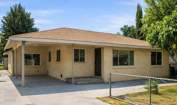 a front view of a house with a garage