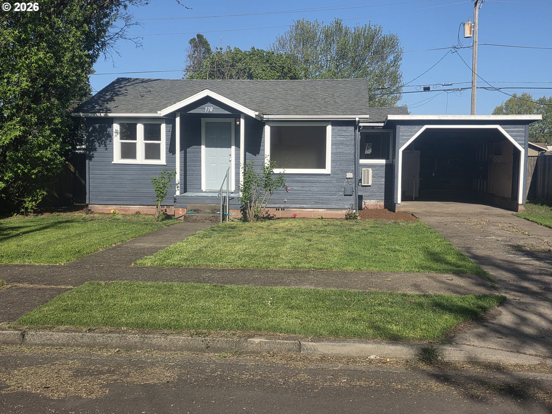 770 Elm Street Junction City, OR 97448 - Photo 1 of 30 a view of a yard in front of house