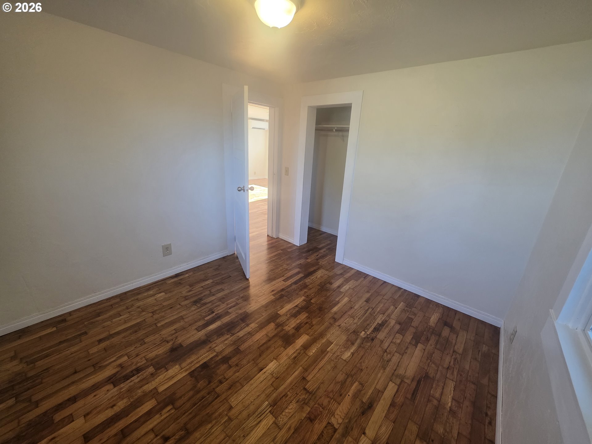 770 Elm Street Junction City, OR 97448 - Photo 15 of 30 a view of empty room with wooden floor