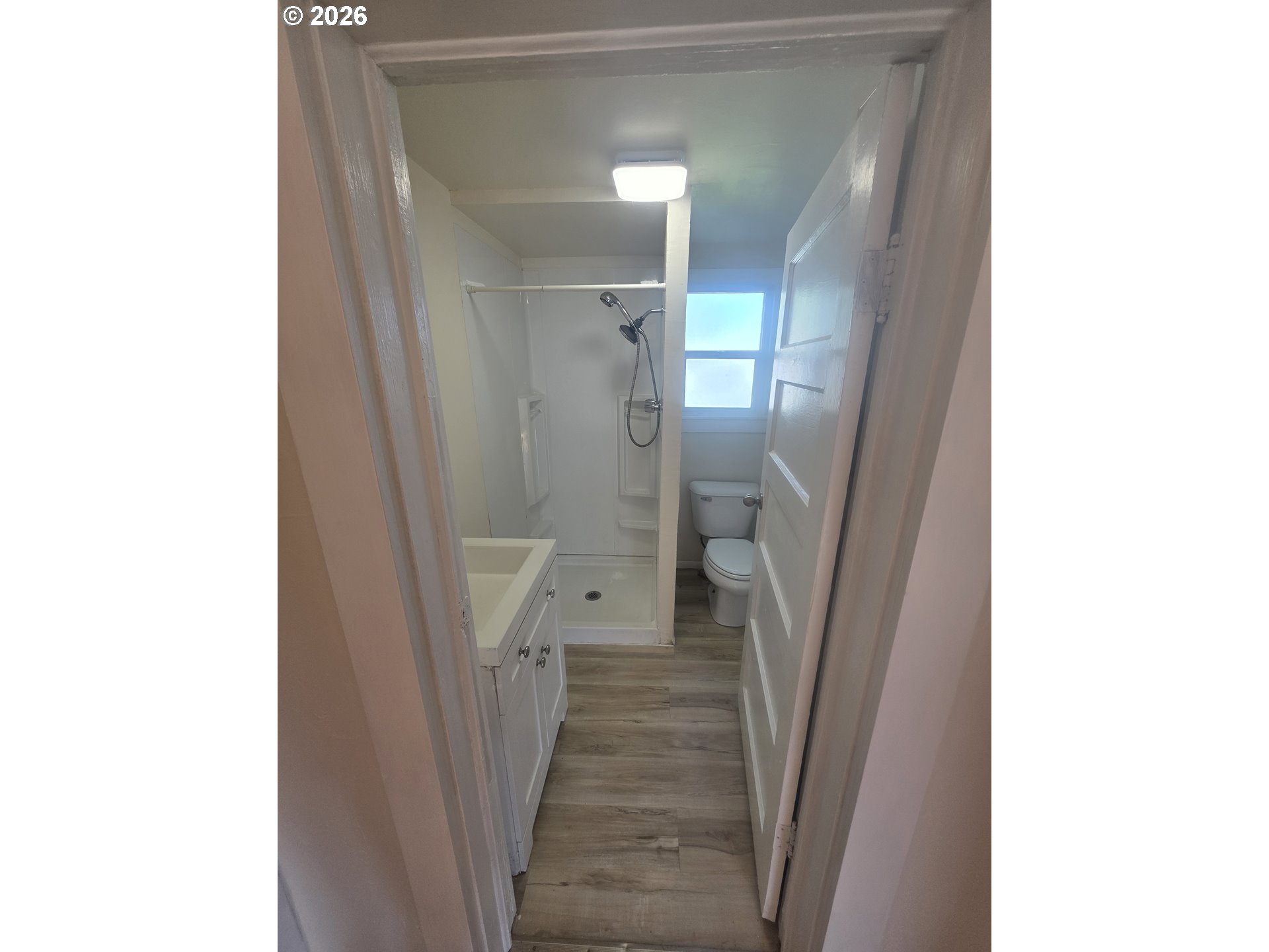 770 Elm Street Junction City, OR 97448 - Photo 17 of 30 a view of a hallway with a white walls