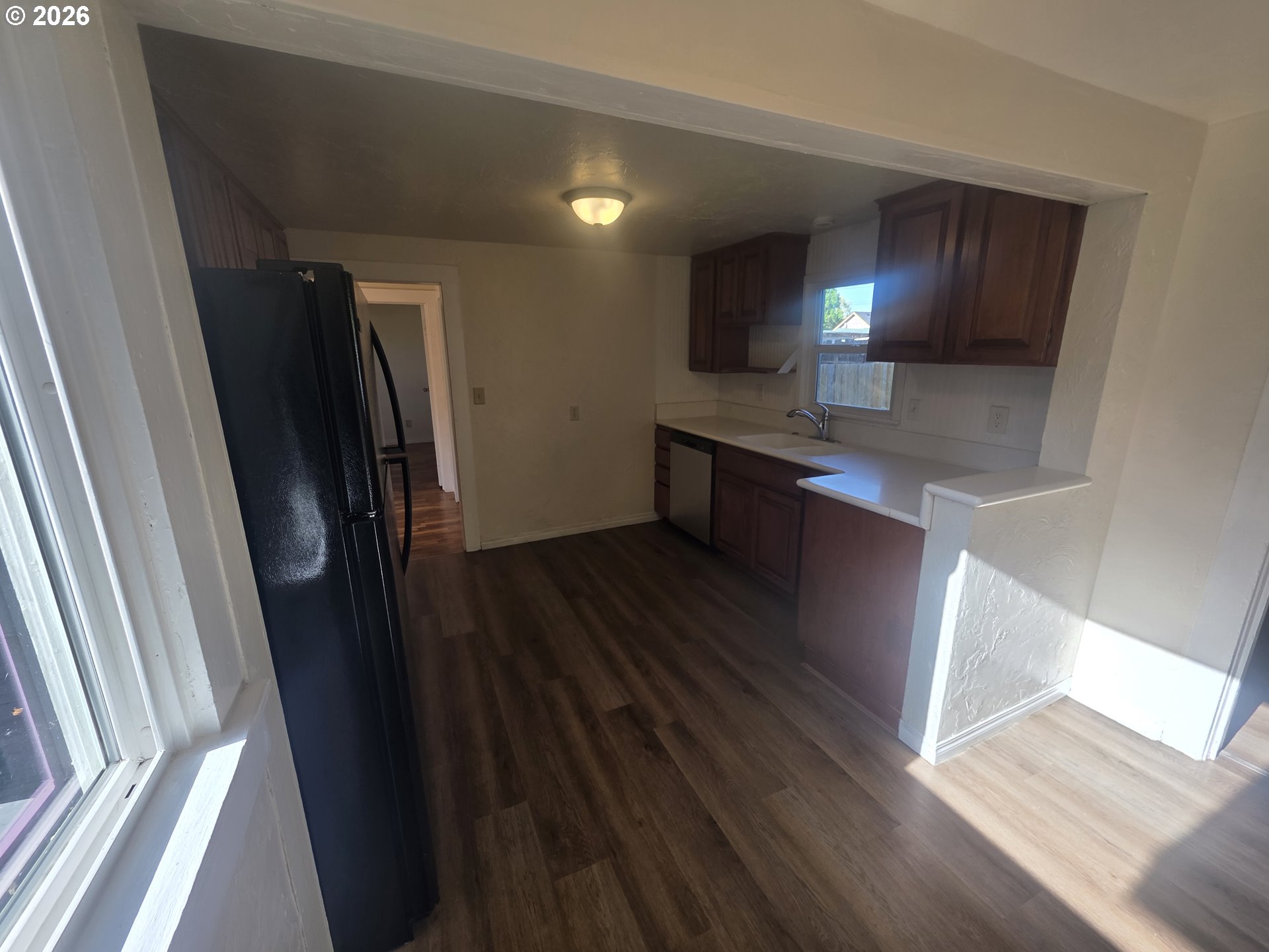 770 Elm Street Junction City, OR 97448 - Photo 20 of 30 a kitchen with stainless steel appliances a refrigerator and a sink