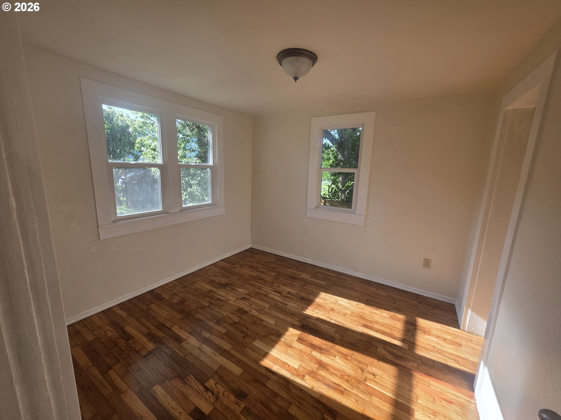 770 Elm Street Junction City, OR 97448 - Photo 8 of 30 a view of an empty room and window