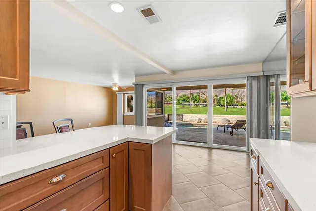 a en suite bathroom with a toilet sink and mirror
