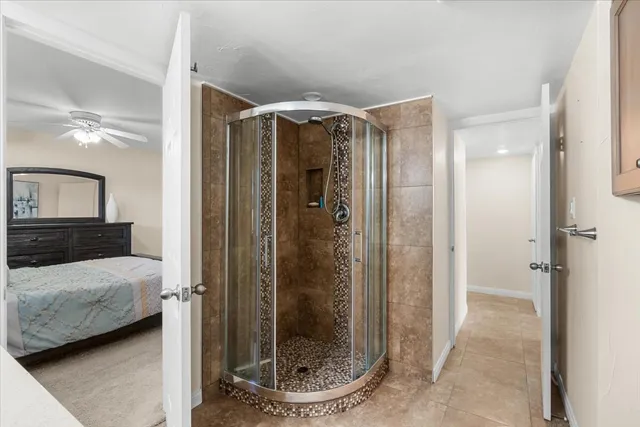 a view of a swimming pool with a patio