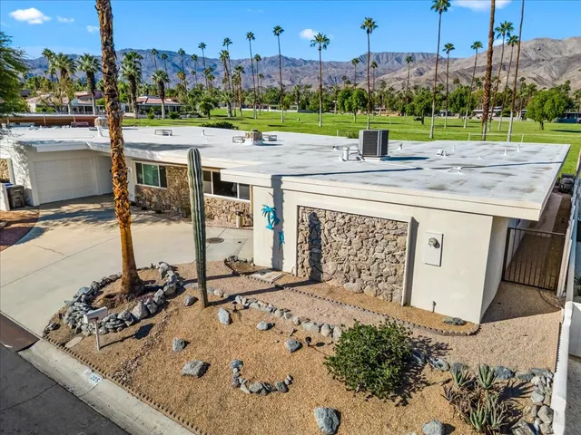 a large building with a view of the ocean