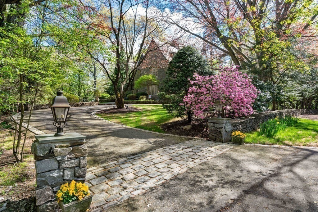 110 Hundreds Road Wellesley, MA 02481 - Photo 2 of 42 a garden view with a sitting space