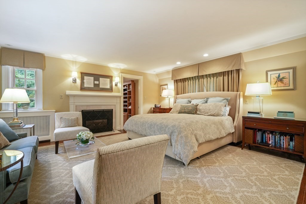 110 Hundreds Road Wellesley, MA 02481 - Photo 28 of 42 a bedroom with a large bed and a couch