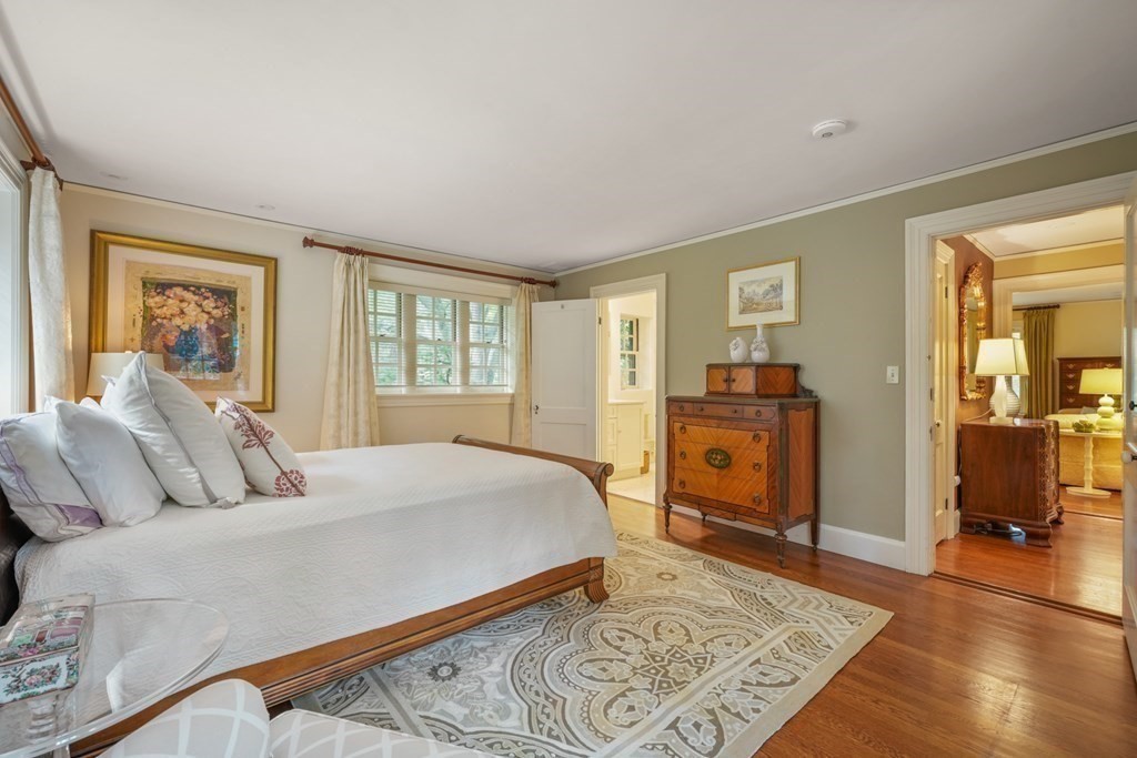 110 Hundreds Road Wellesley, MA 02481 - Photo 33 of 42 a bedroom with a large bed and a window