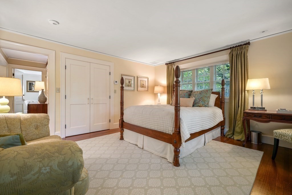 110 Hundreds Road Wellesley, MA 02481 - Photo 34 of 42 a bedroom with a bed and large window