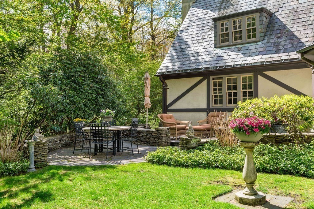 110 Hundreds Road Wellesley, MA 02481 - Photo 41 of 42 a backyard of a house with lots of green space