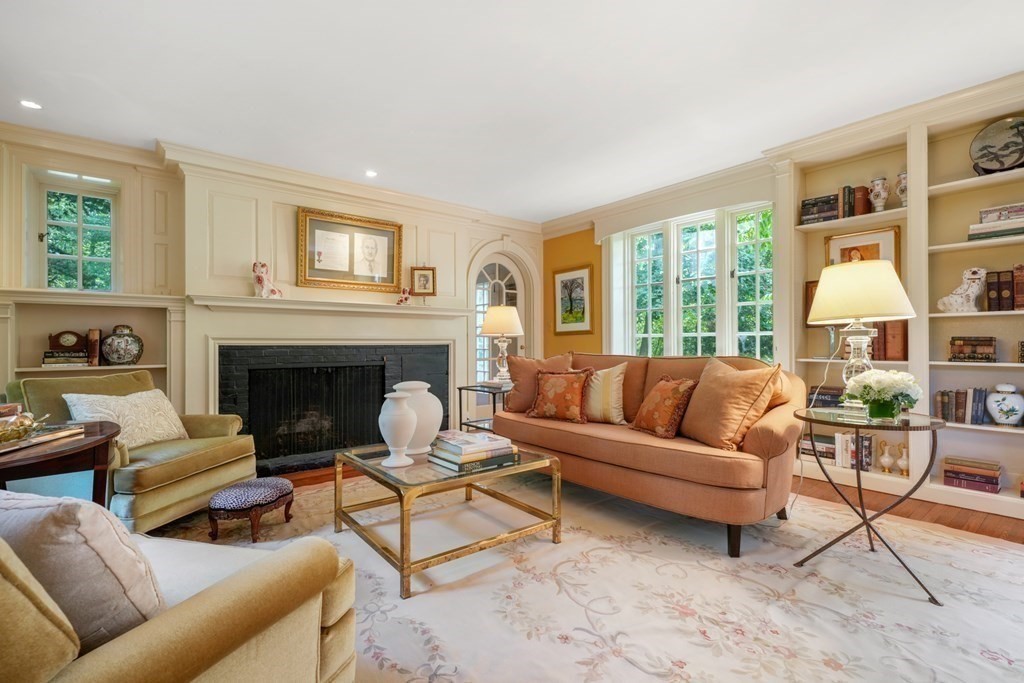 110 Hundreds Road Wellesley, MA 02481 - Photo 9 of 42 a living room with furniture and a fireplace