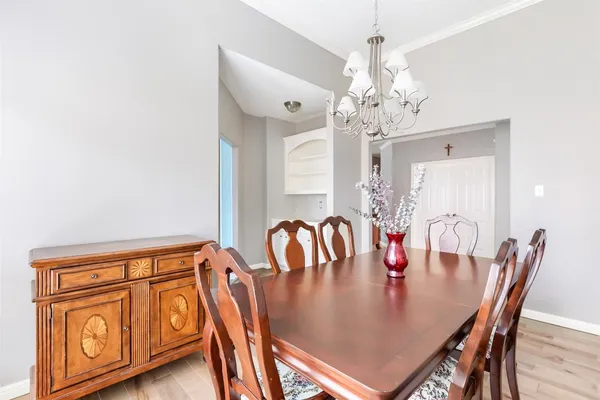 a view of a dining room with furniture