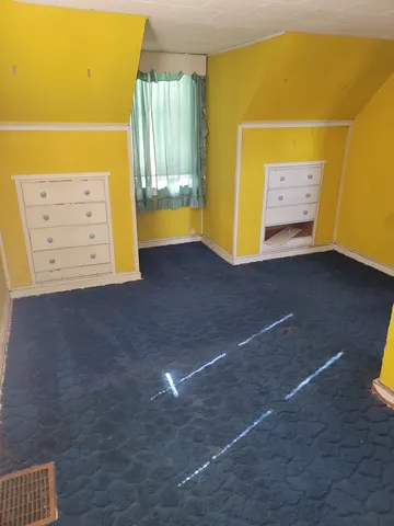 a view of a closet with windows