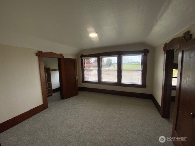 790 East Badger Road Lynden, WA 98264 - Photo 12 of 26 an empty room with windows