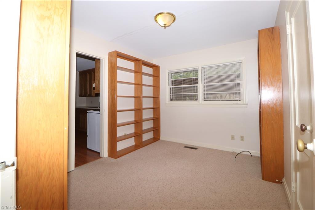 3514 Normandy Road Greensboro, NC 27408 - Photo 11 of 14 Bedroom with shelving