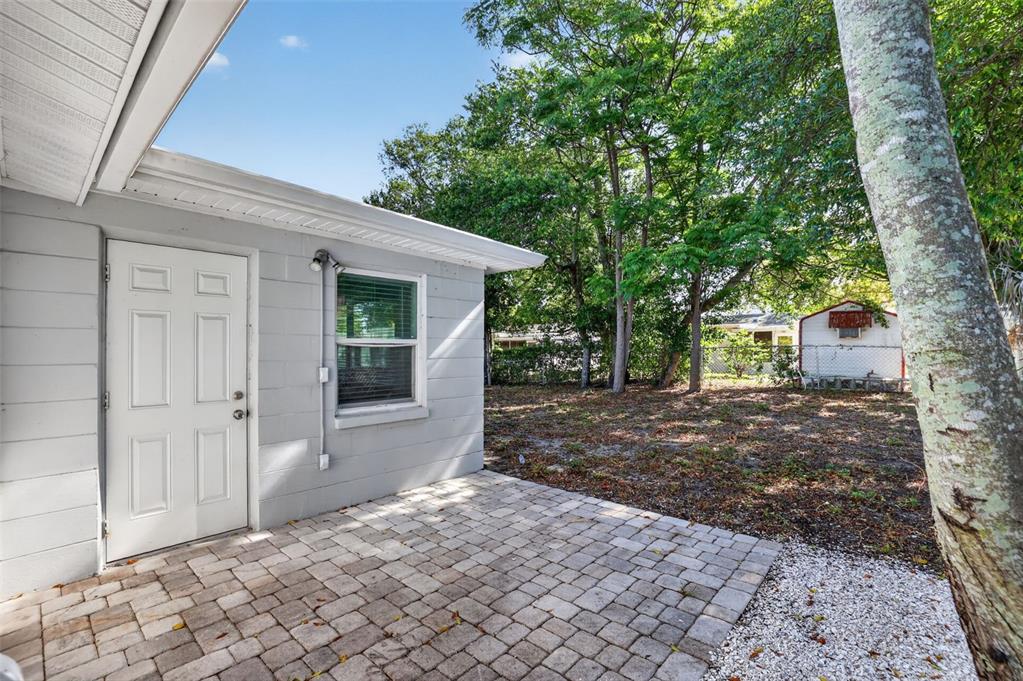 10914 Leeds Road Port Richey, FL 34668 - Photo 18 of 24 a view of a house with a yard
