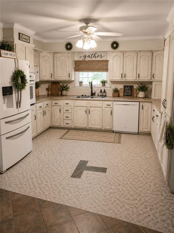 392 Nickelsville Road Northeast Resaca, GA 30735 - Photo 11 of 14 a kitchen with white cabinets and white appliances
