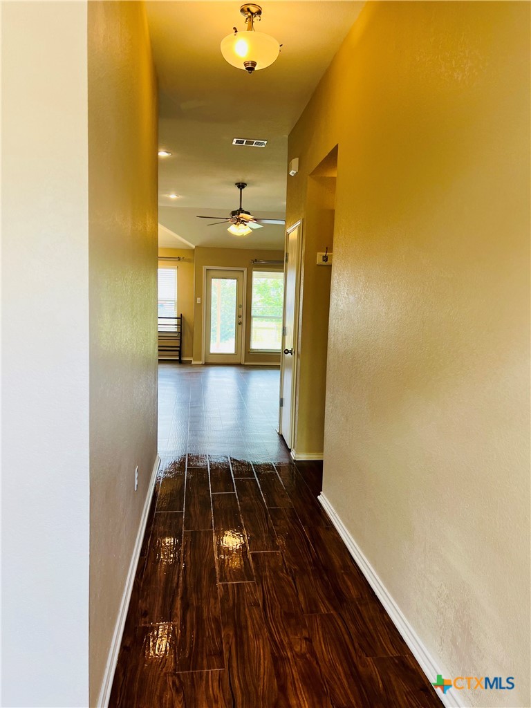 8210 Sunset Trail Temple, TX 76502 - Photo 2 of 15 a view of a hallway with wooden floor