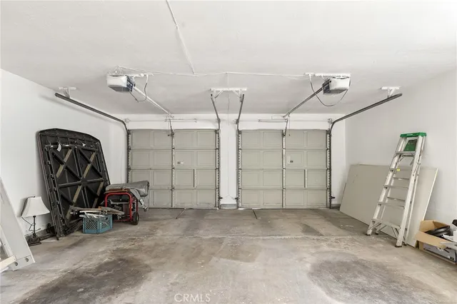 a view of an empty room with wooden walls