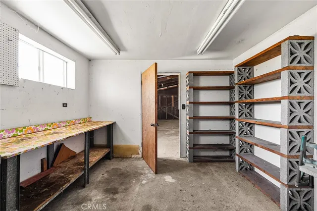 a view of yard with swimming pool and green space