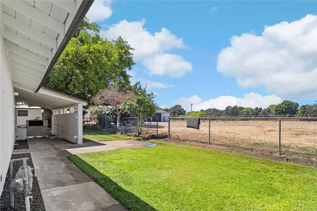 a view of empty room with wooden walls