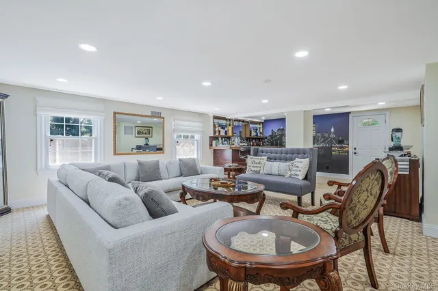 a living room with furniture and a table