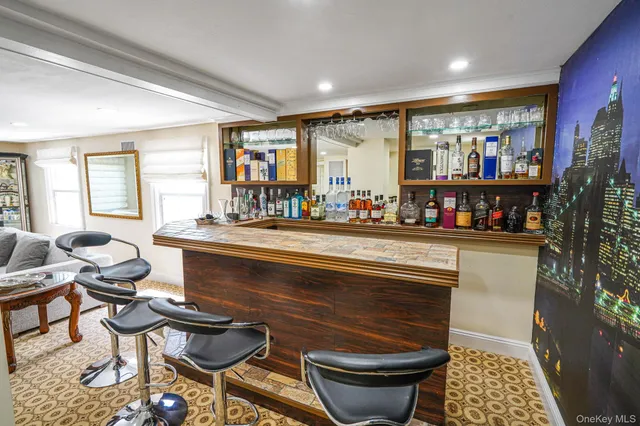 a kitchen with a sink and a refrigerator