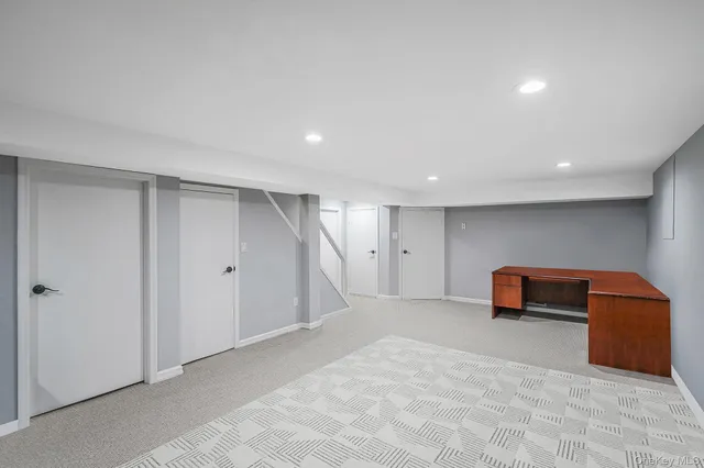 a view of room with furniture and a window