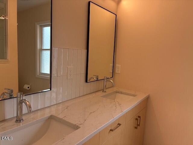1212 Brookside Drive Raleigh, NC 27604 - Photo 21 of 42 a bathroom with a sink and a mirror