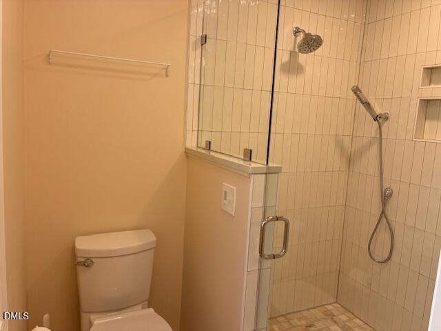 1212 Brookside Drive Raleigh, NC 27604 - Photo 22 of 42 a bathroom with a shower